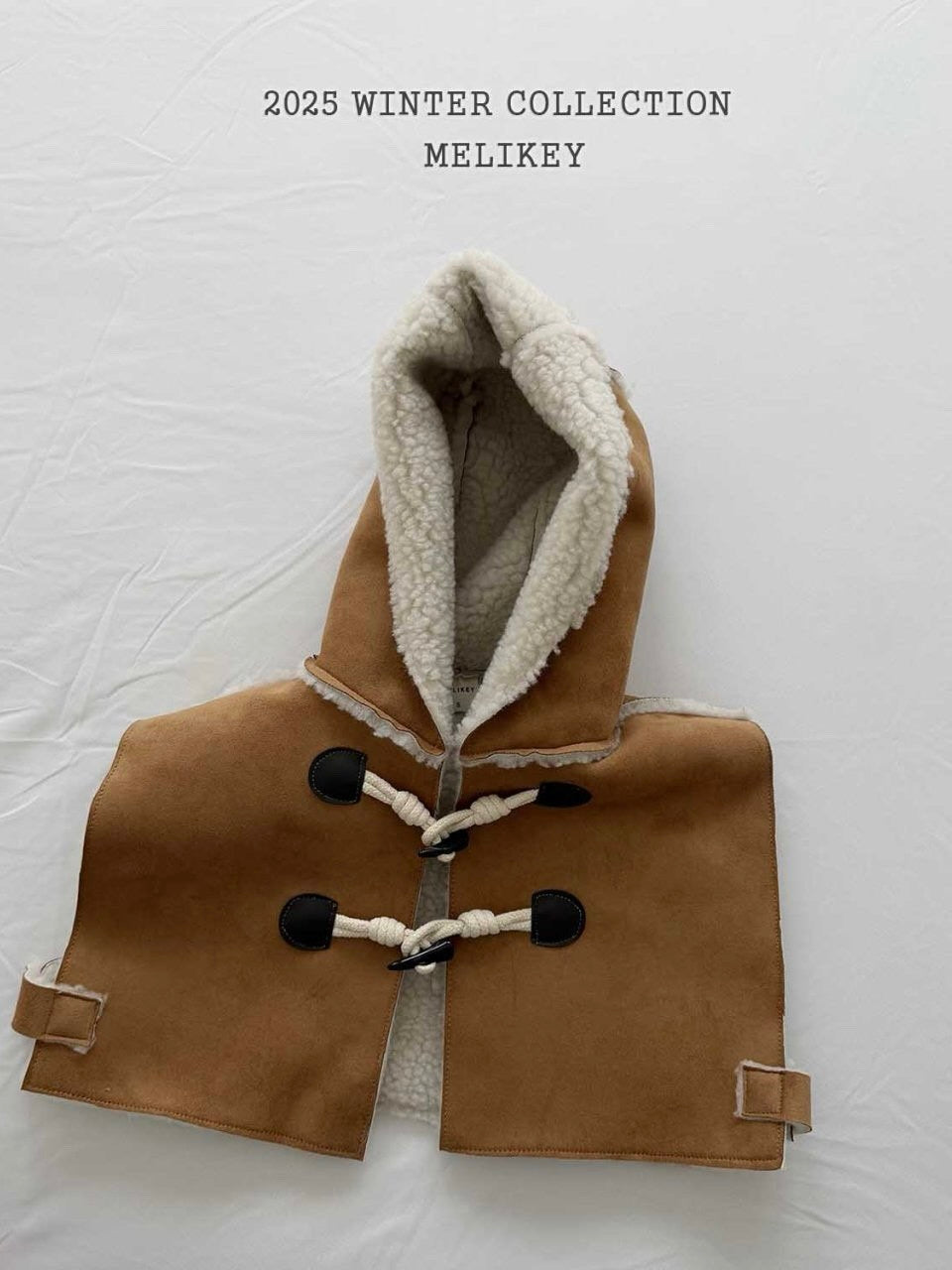 Shearling hooded cape