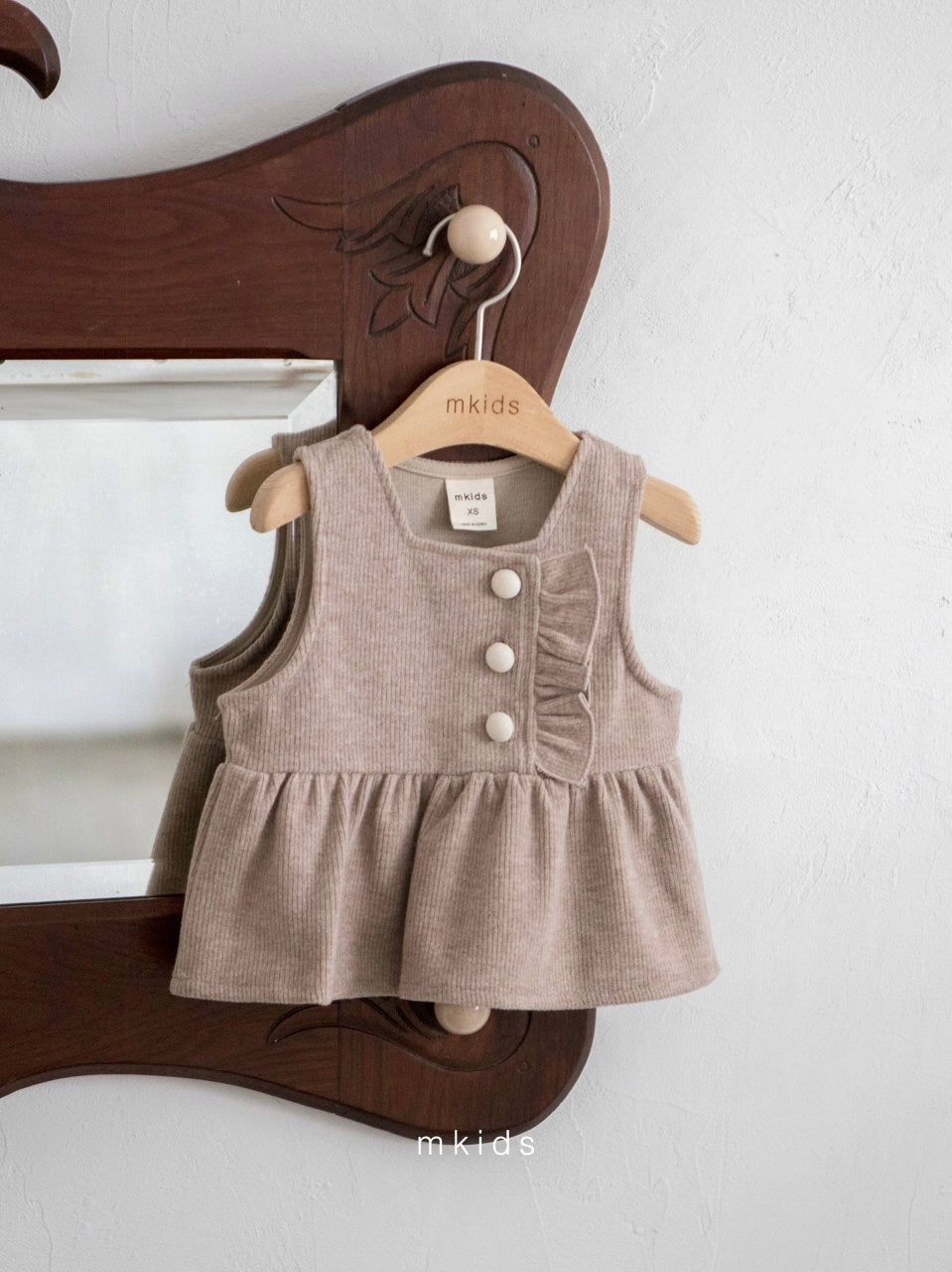 Peplum vest