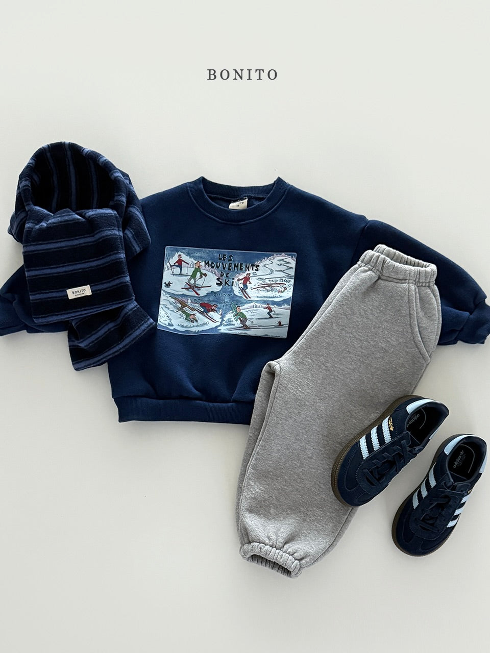 Point stripe muffler