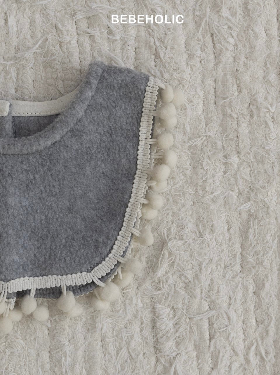 Pom pom bib