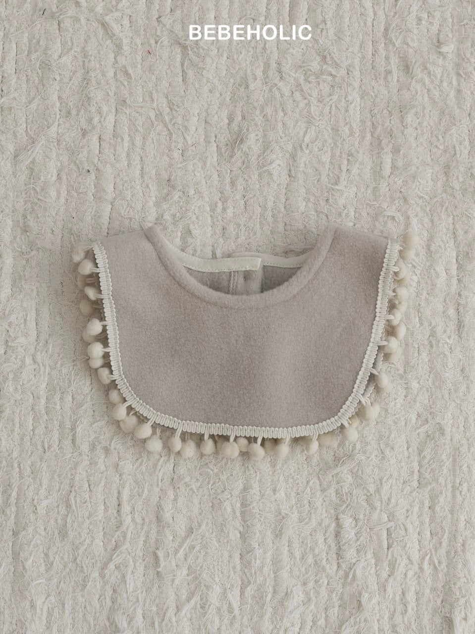 Pom pom bib