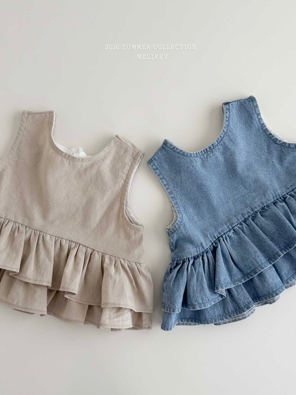 Ribbon tiered sleeveless blouse
