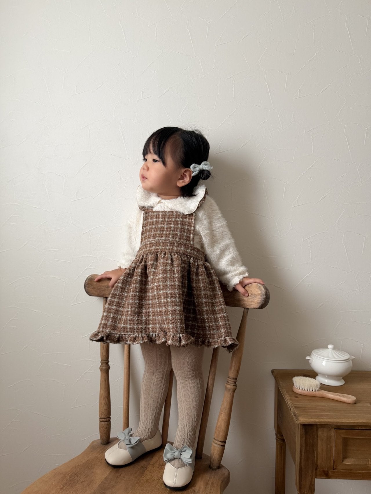 Check suspender one piece