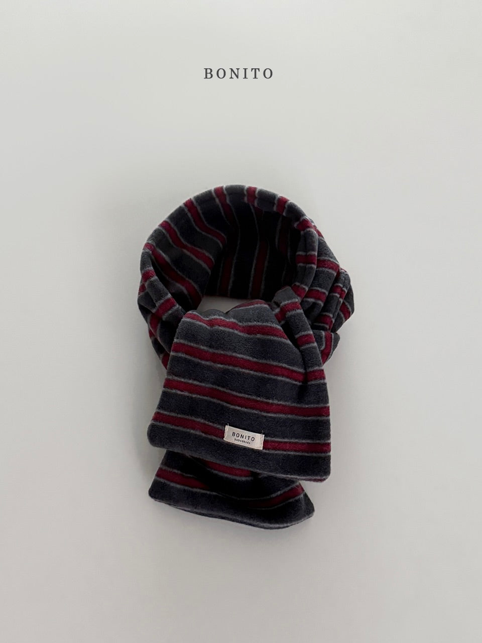 Point stripe muffler