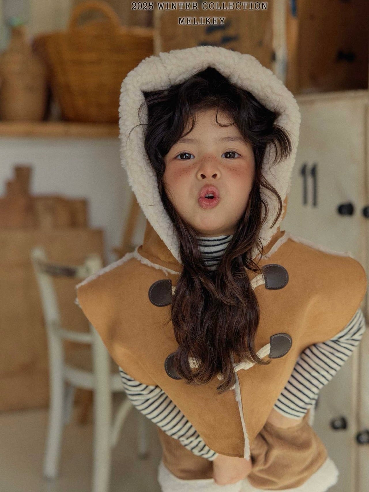 Shearling hooded cape