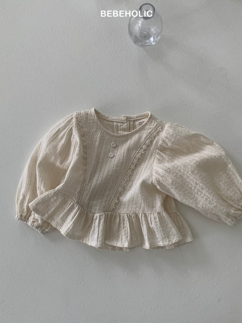 Lace frill peplum blouse