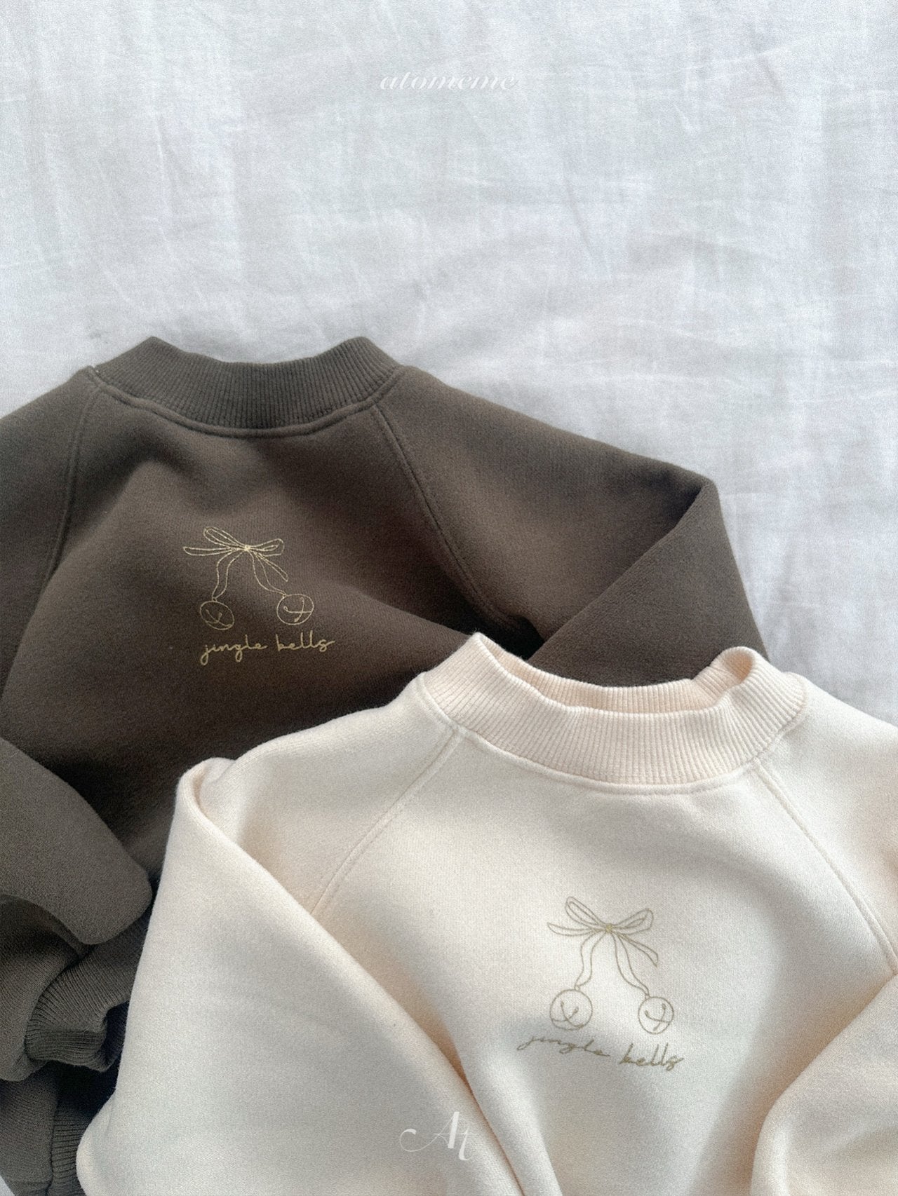 Ribbon bell sweatshirt