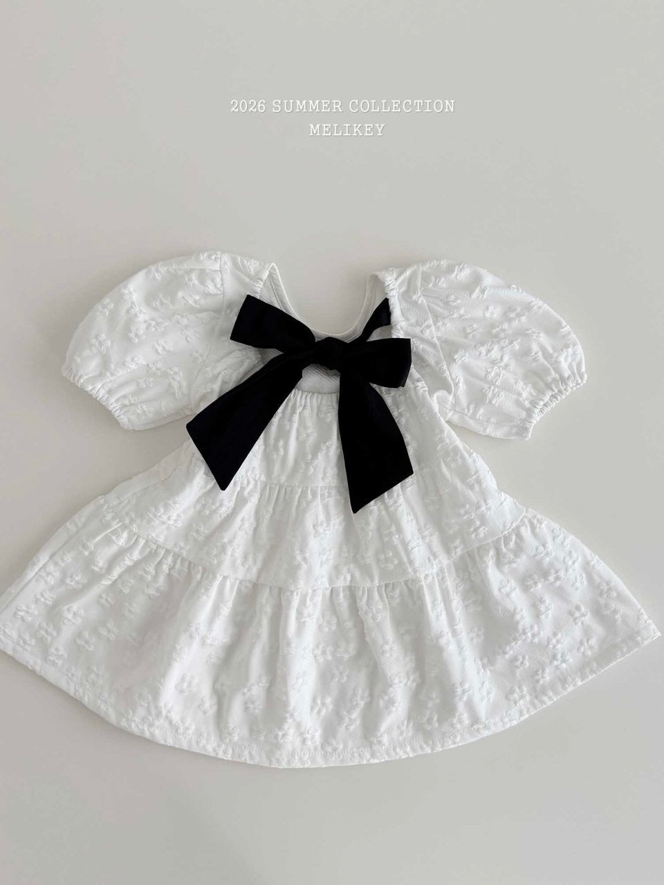 Shine back ribbon one piece