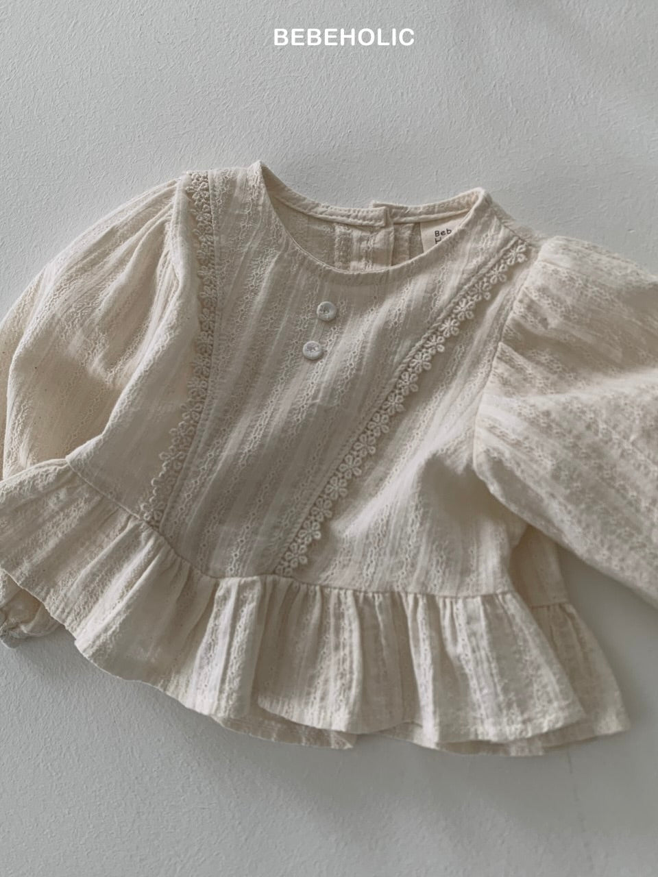 Lace frill peplum blouse