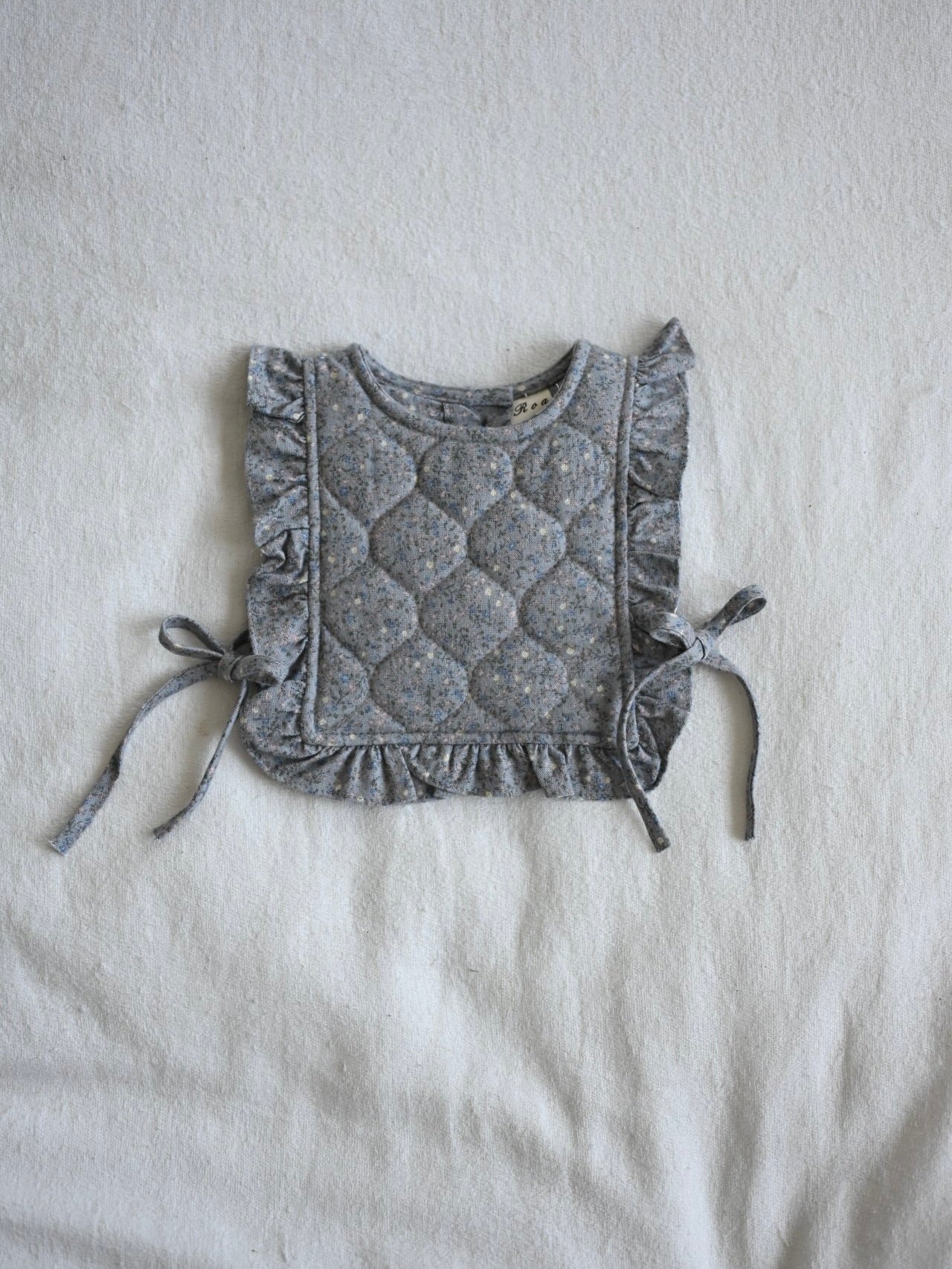 Mini quilted vest