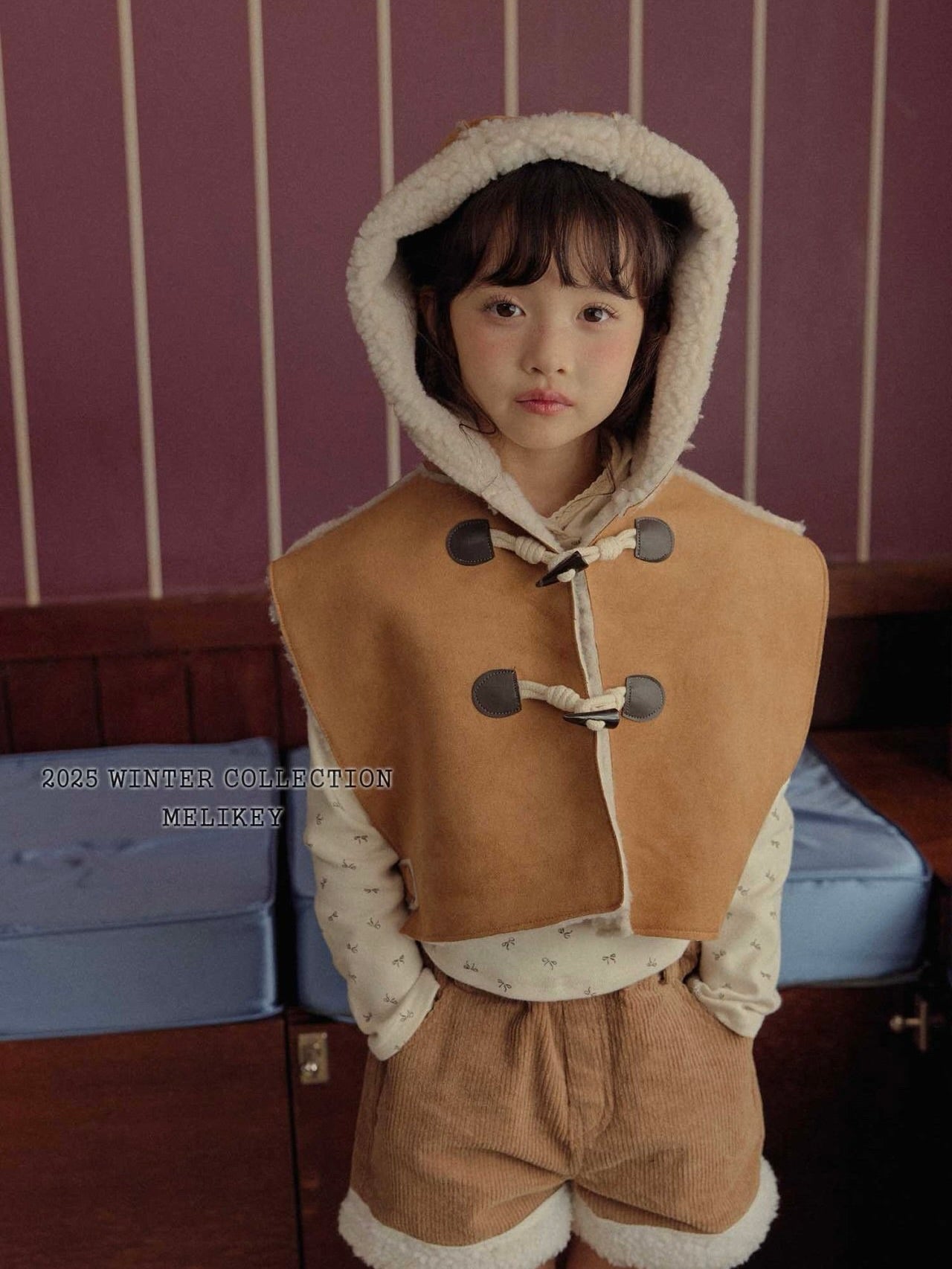 Shearling hooded cape