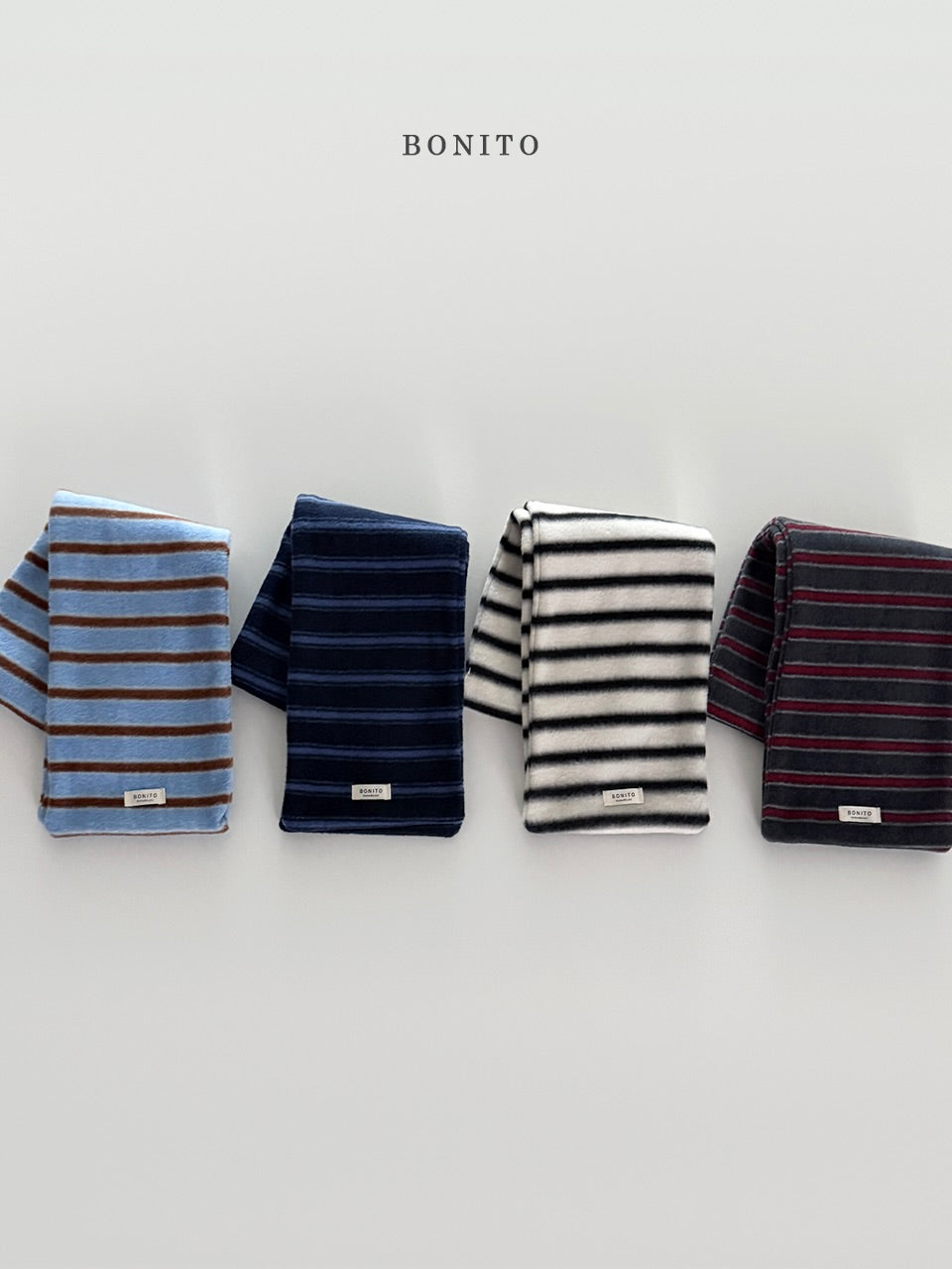 Point stripe muffler