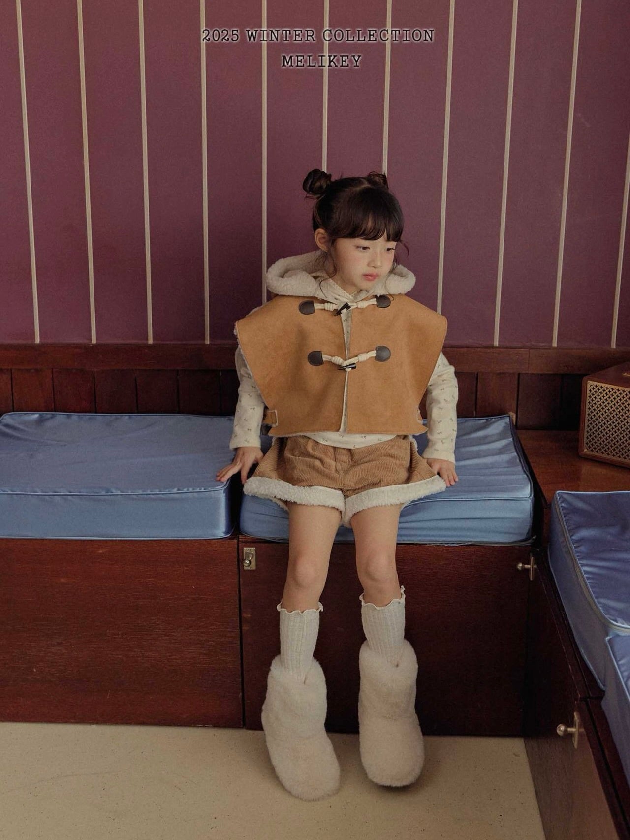 Shearling hooded cape