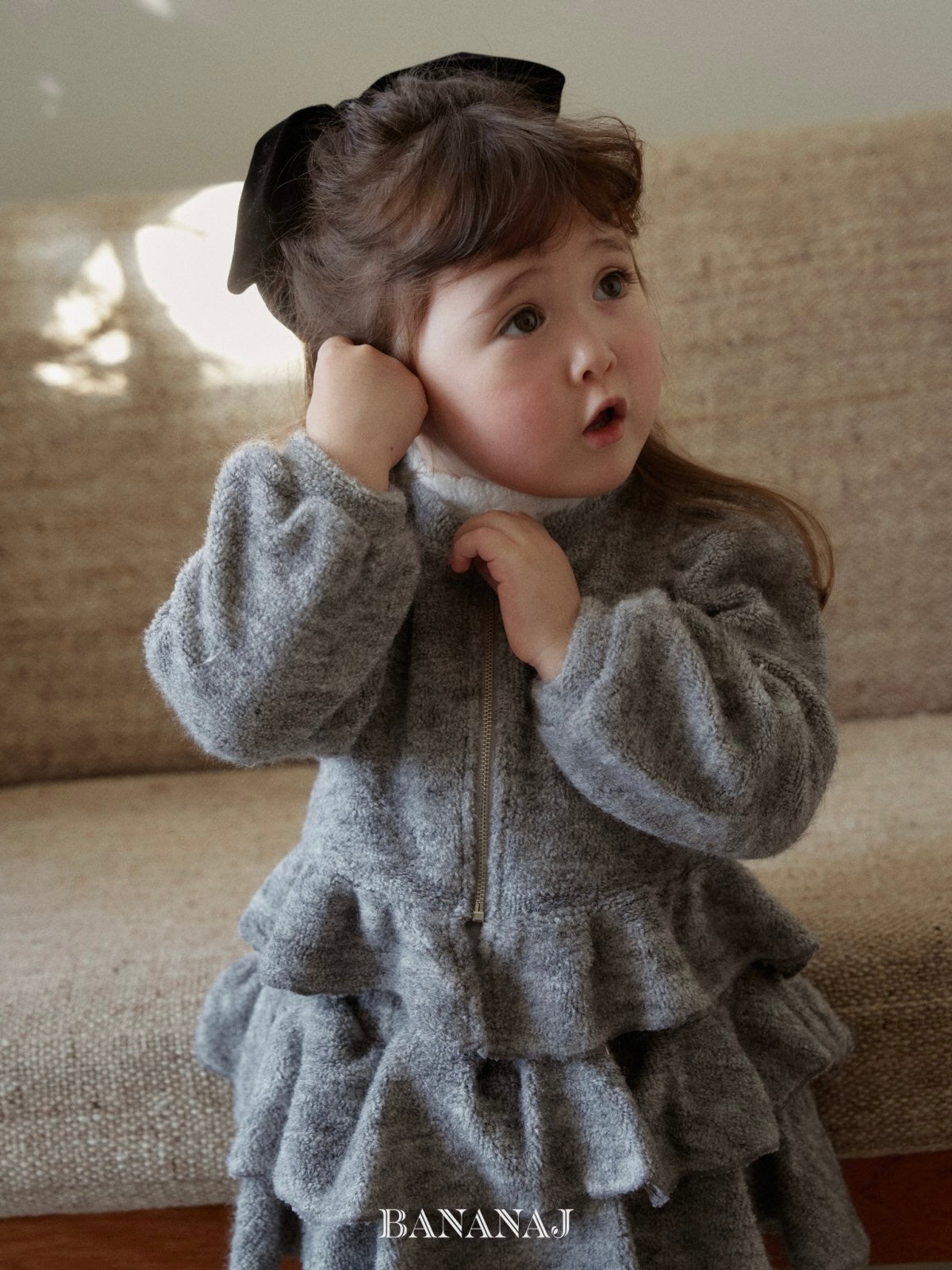 Peplum zip-up cardigan