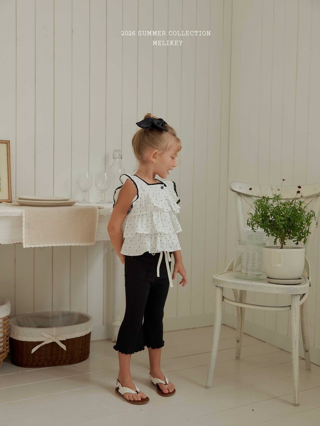 Dot tiered sleeveless top