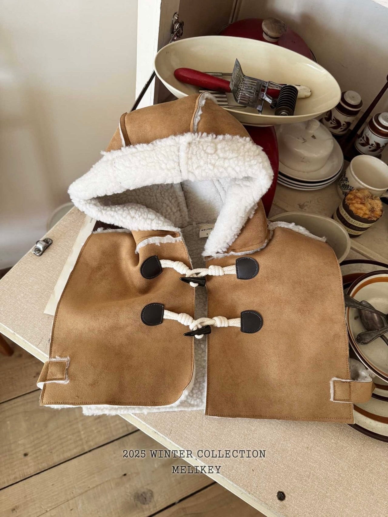 Shearling hooded cape