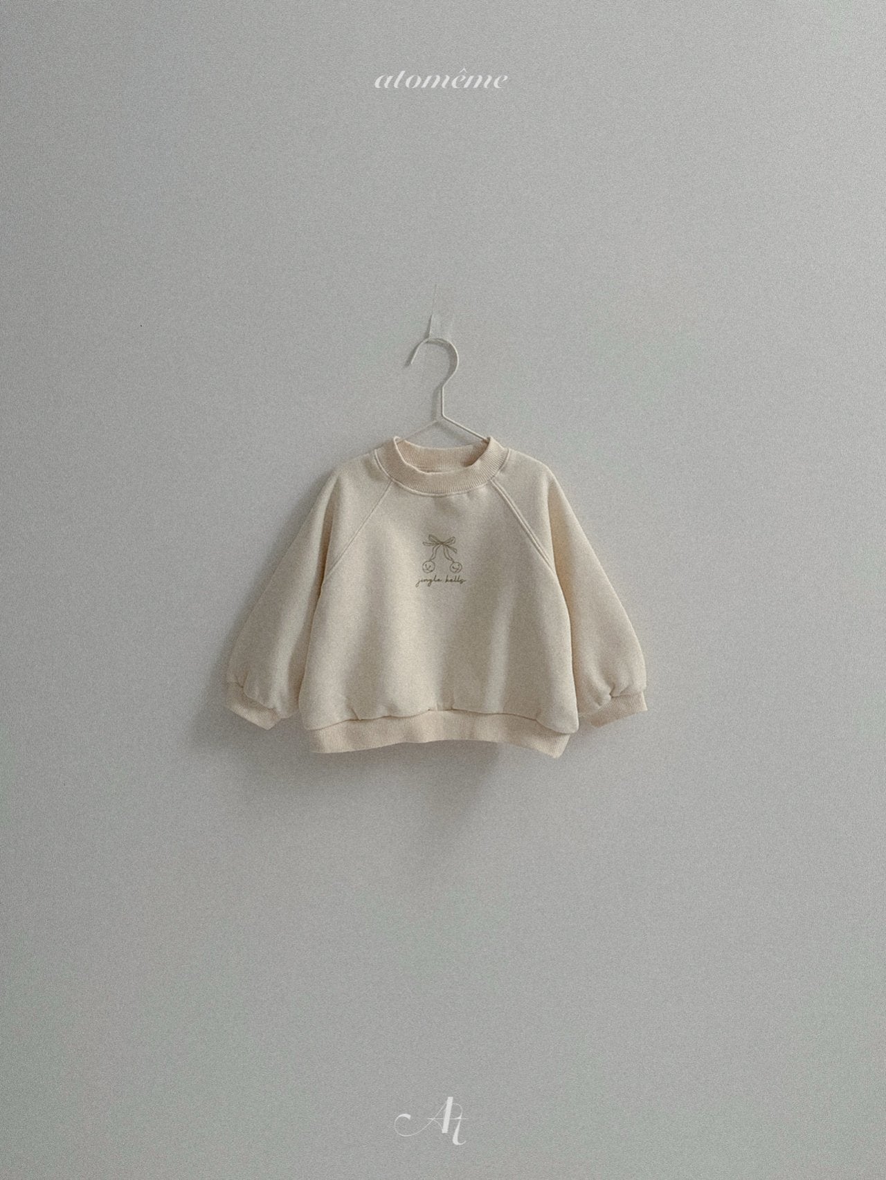 Ribbon bell sweatshirt