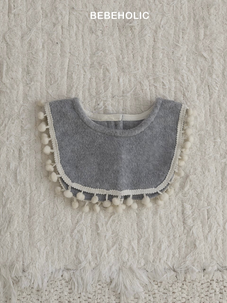 Pom pom bib