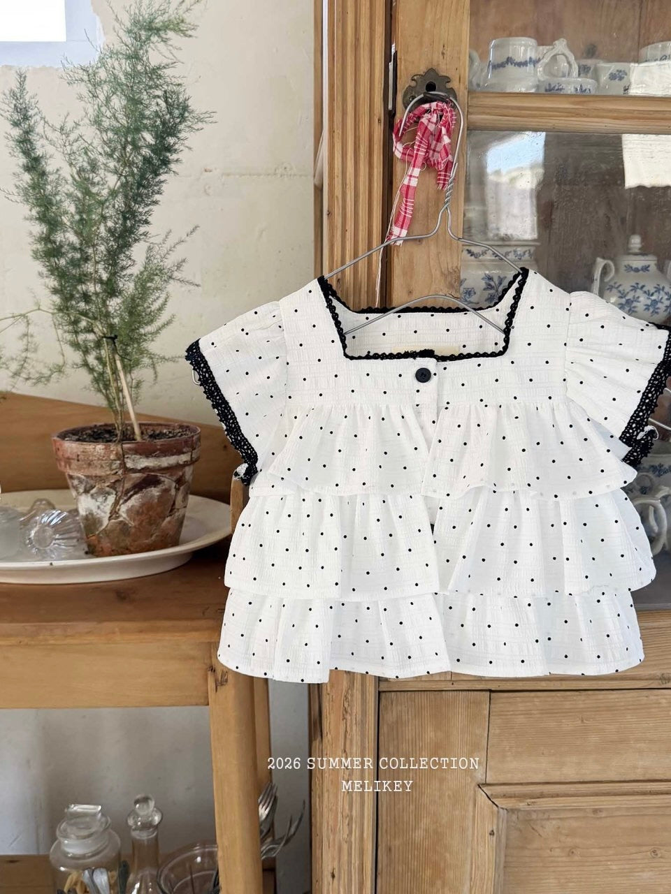 Dot tiered sleeveless top