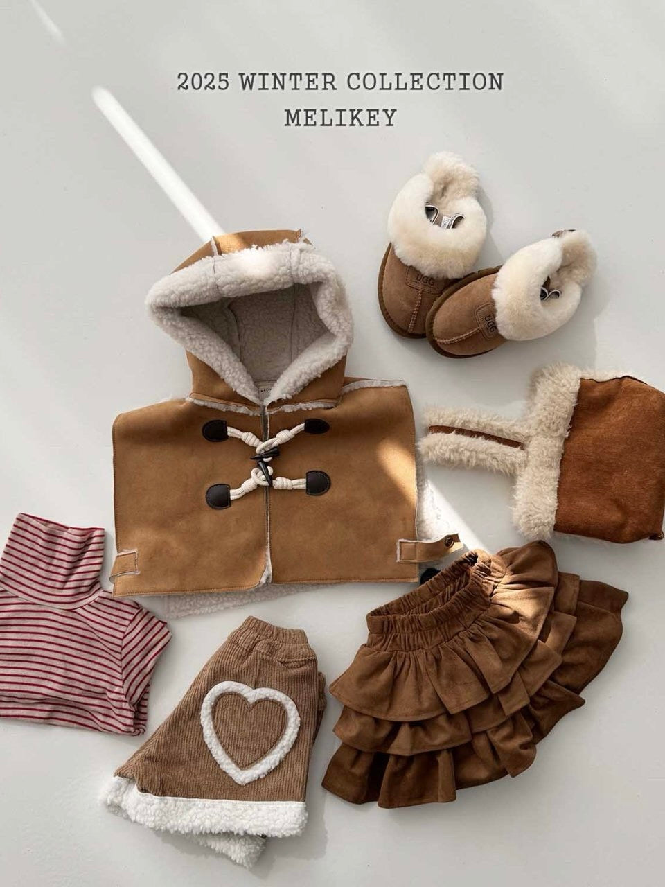 Shearling hooded cape