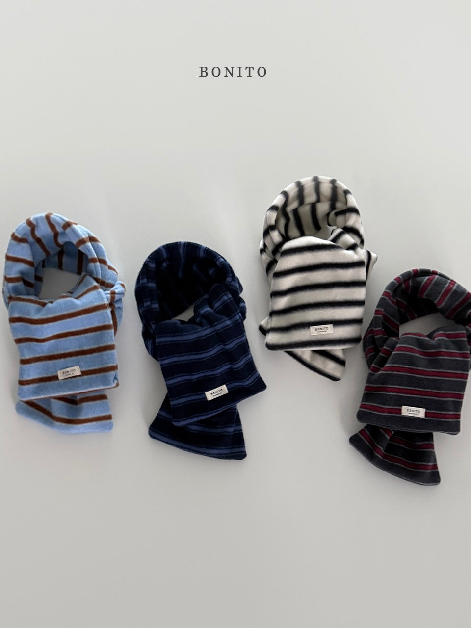 Point stripe muffler