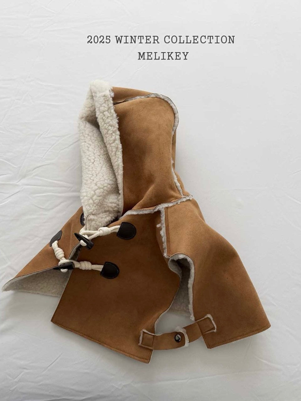 Shearling hooded cape