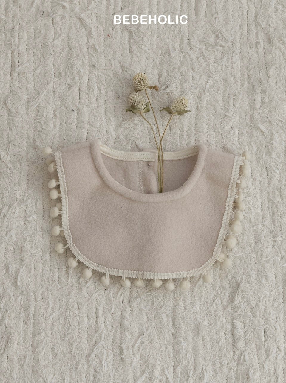 Pom pom bib