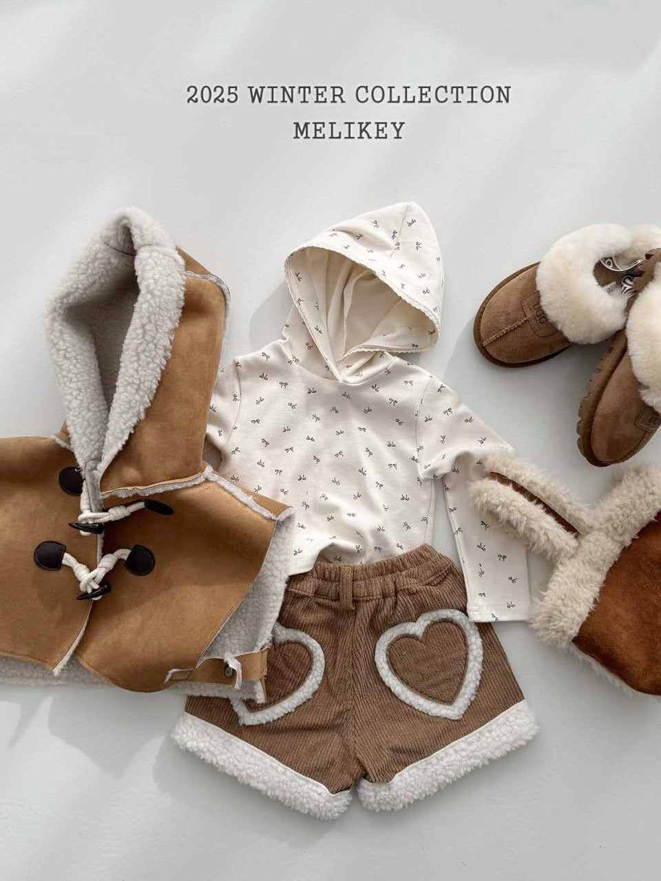 Shearling hooded cape