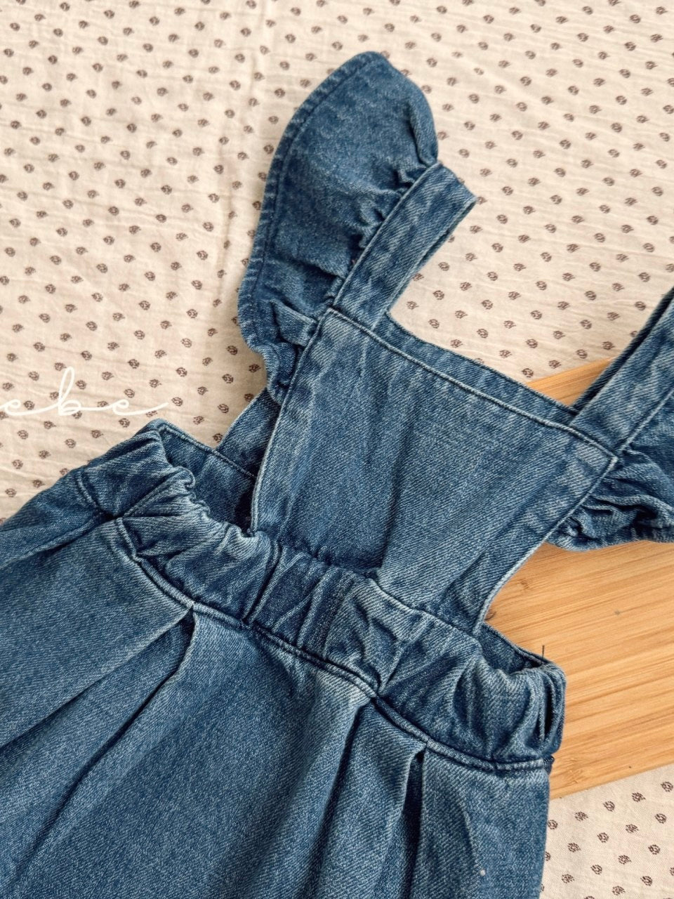 Frill wing denim one piece