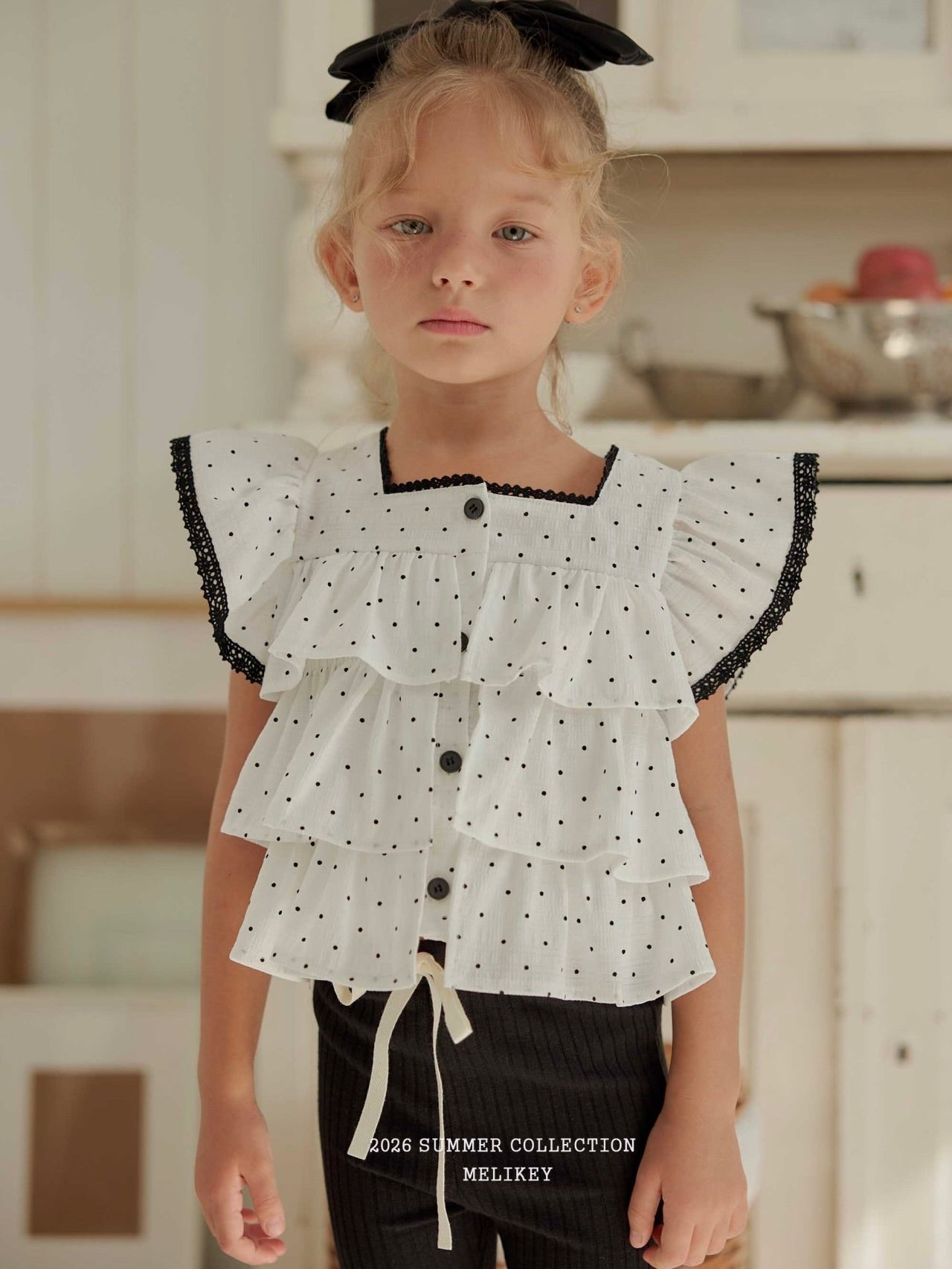 Dot tiered sleeveless top