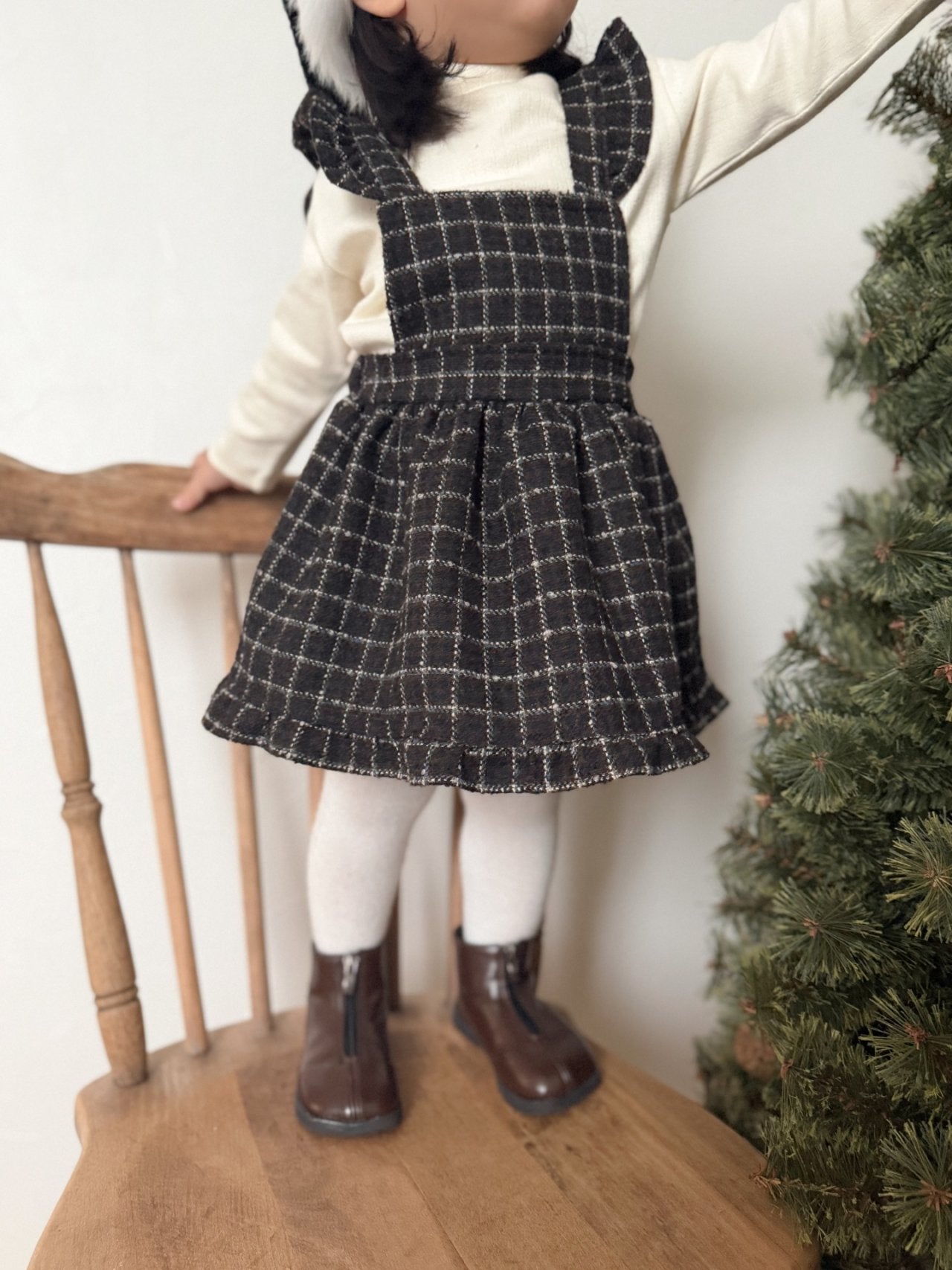 Check suspender one piece