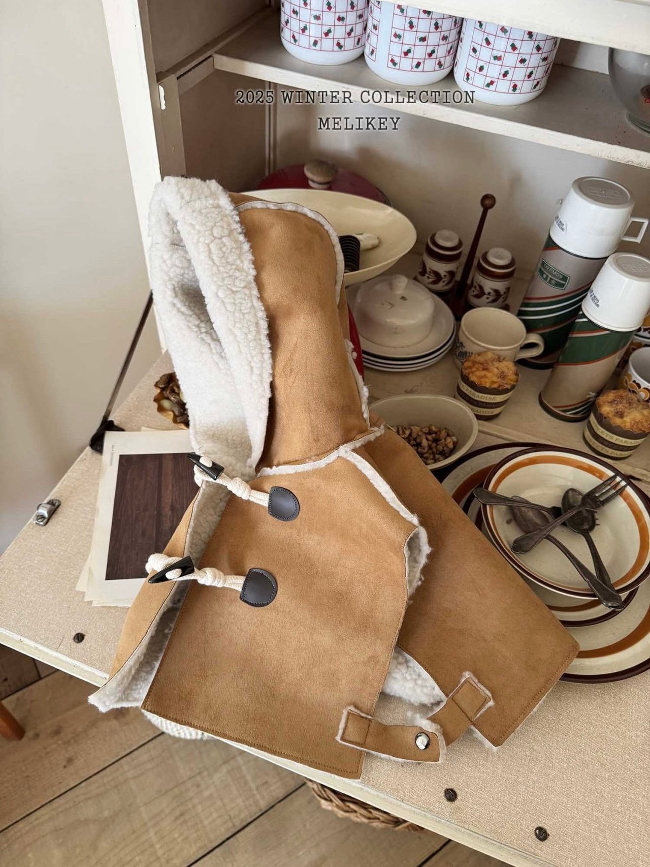 Shearling hooded cape