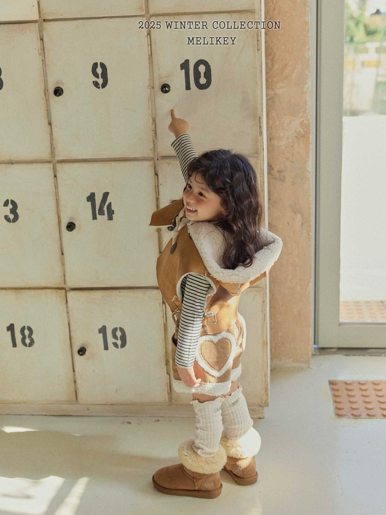 Shearling hooded cape