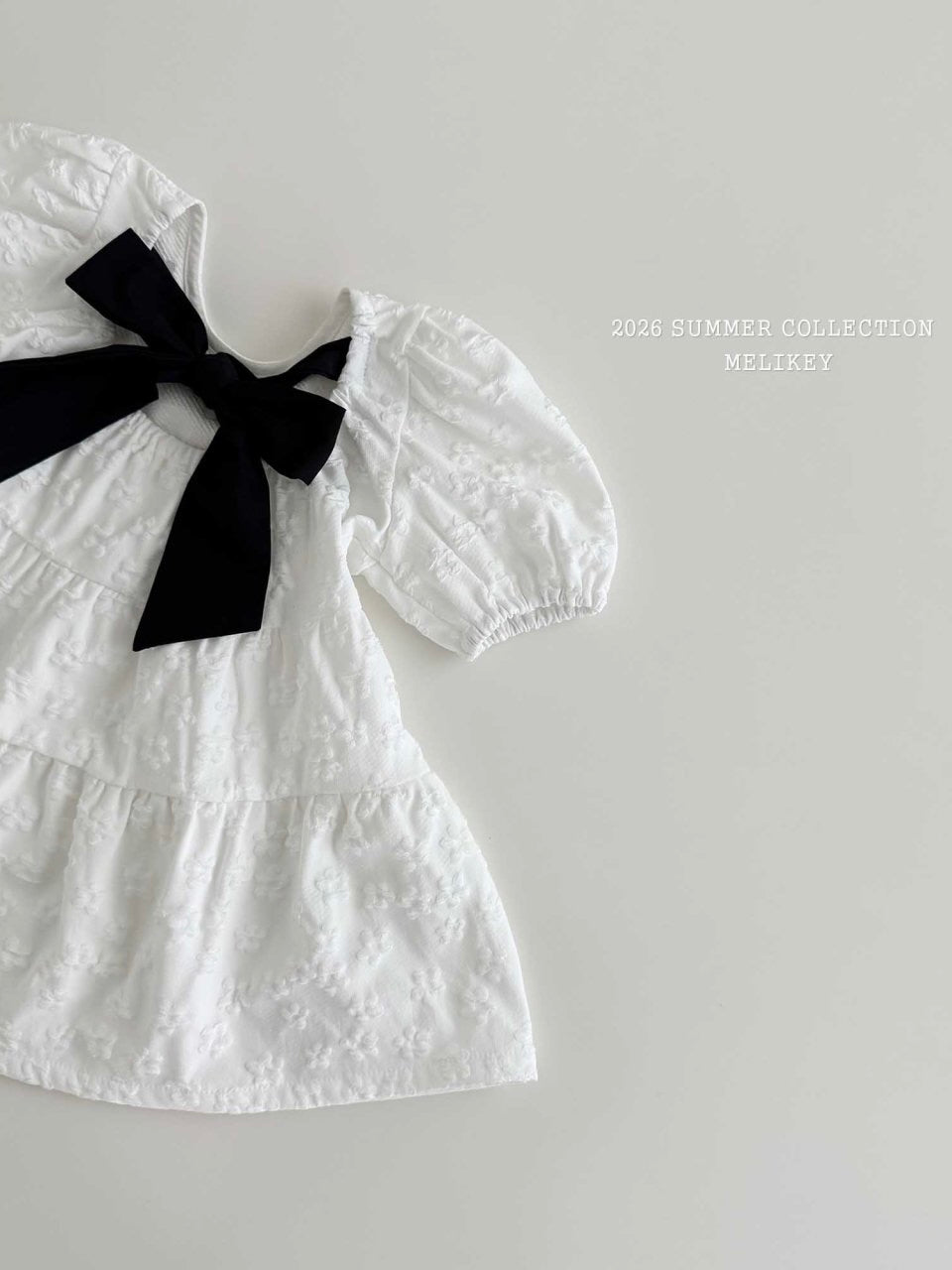 Shine back ribbon one piece
