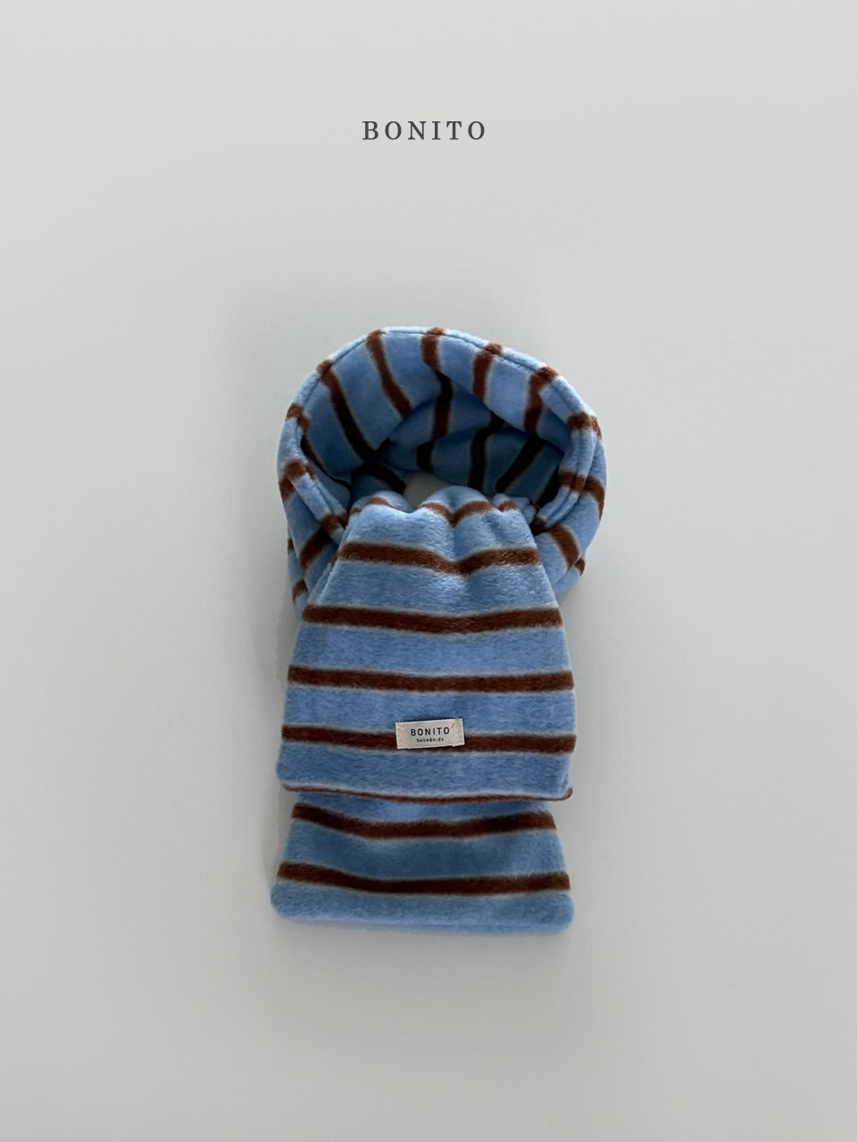 Point stripe muffler