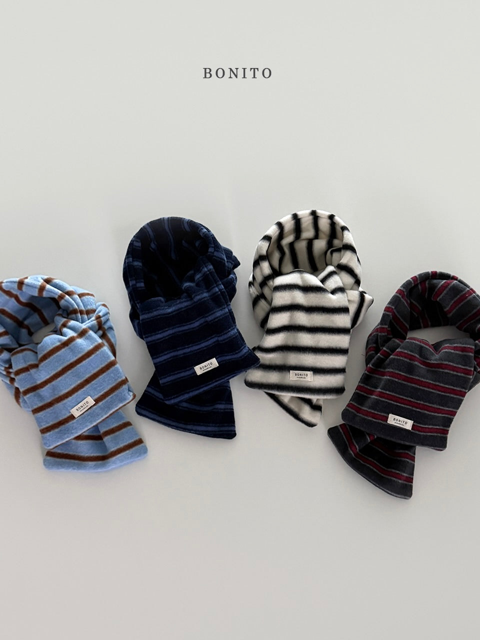 Point stripe muffler