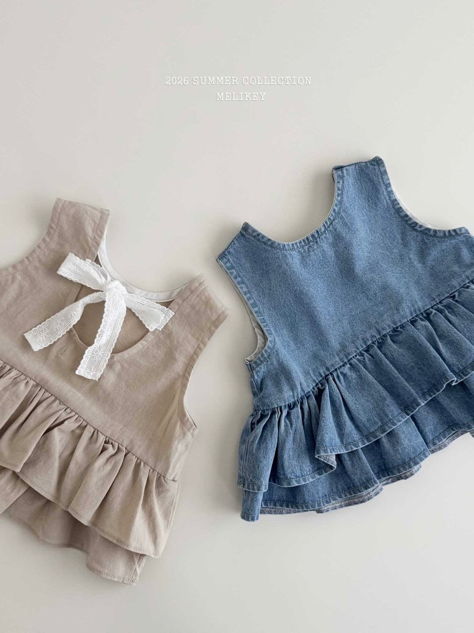 Ribbon tiered sleeveless blouse