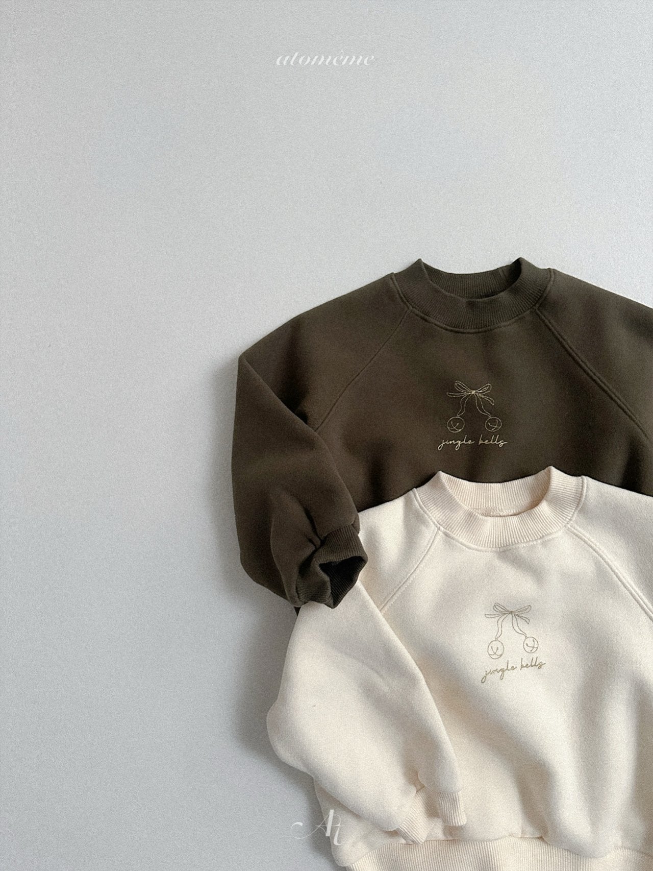 Ribbon bell sweatshirt