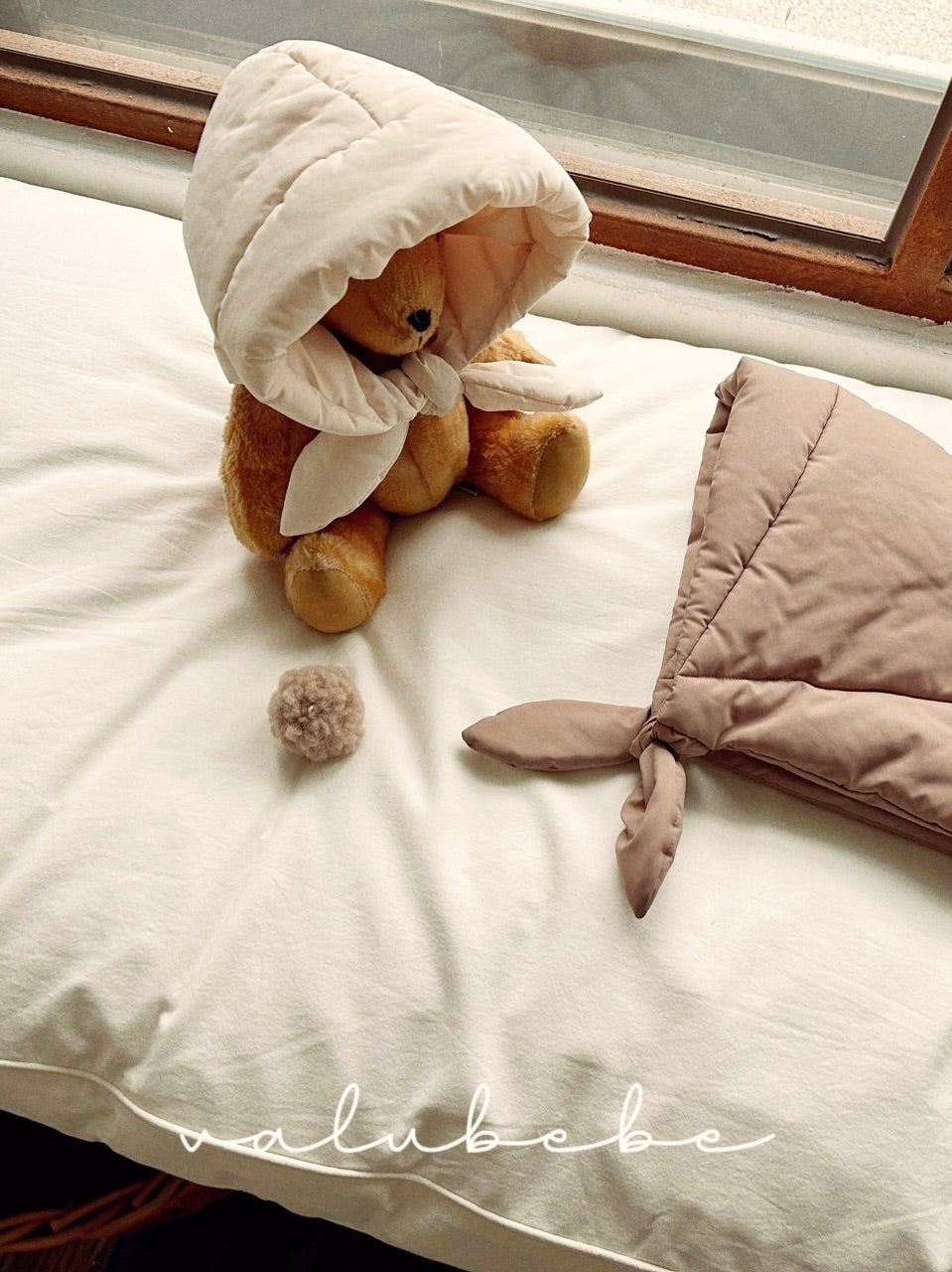 Padded bonnet (baby)