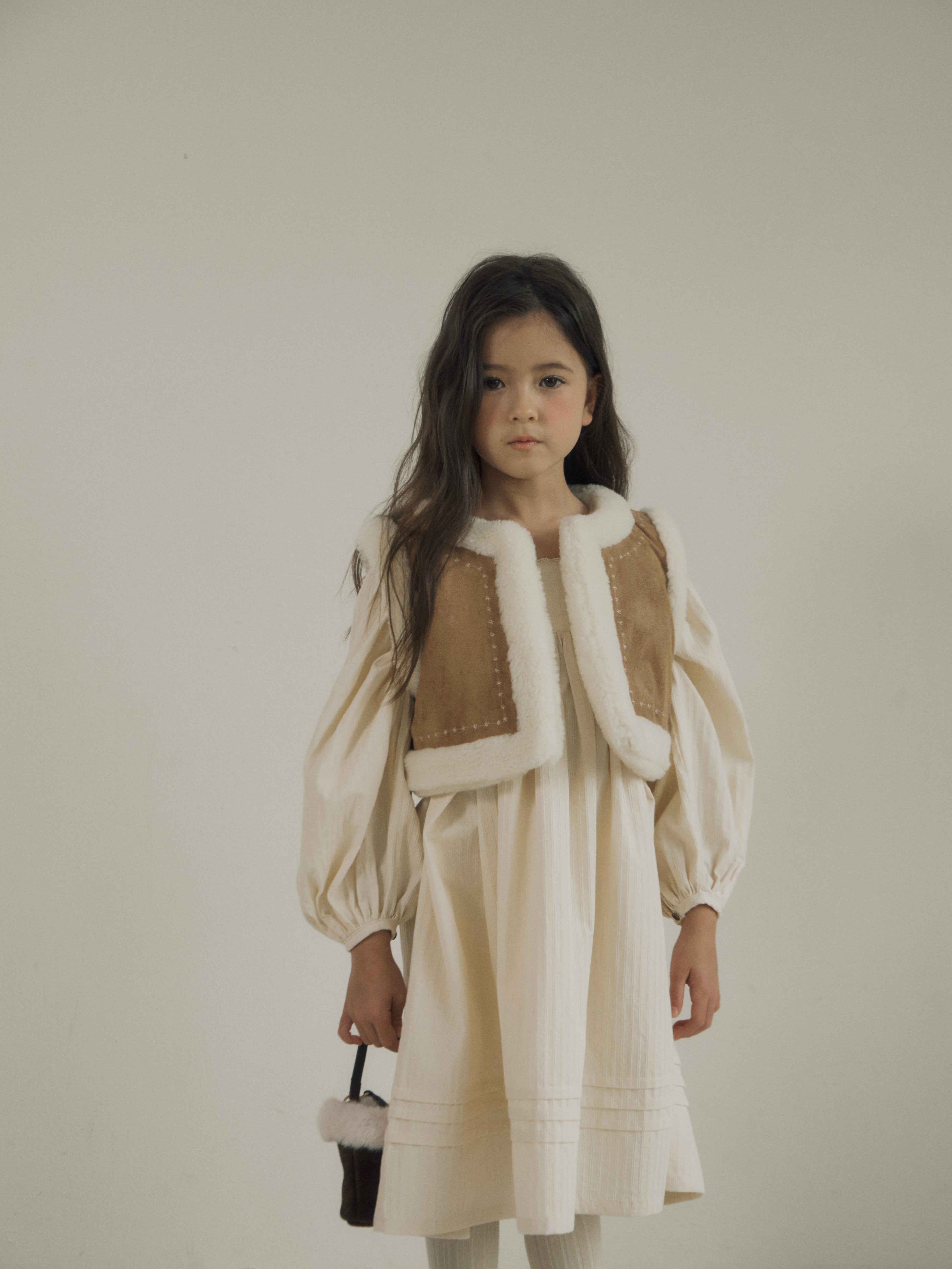 Suede reversible fur vest