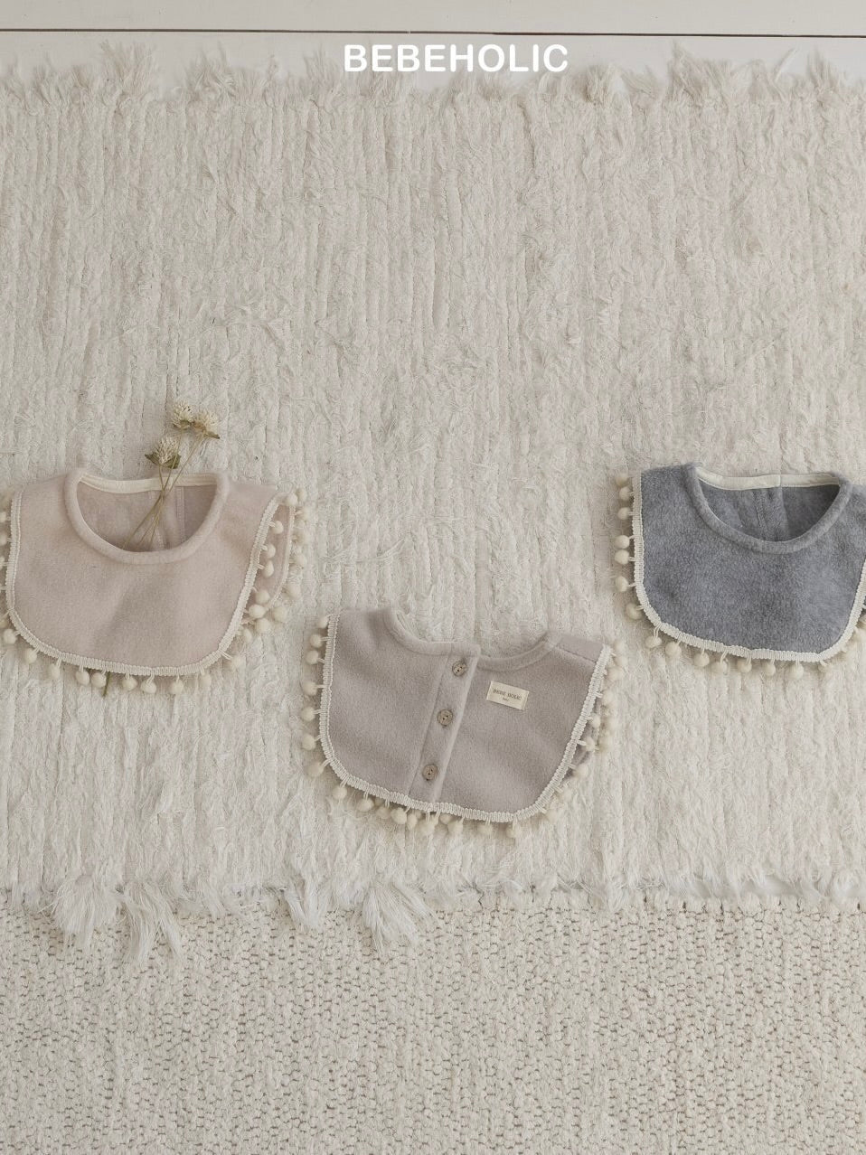 Pom pom bib